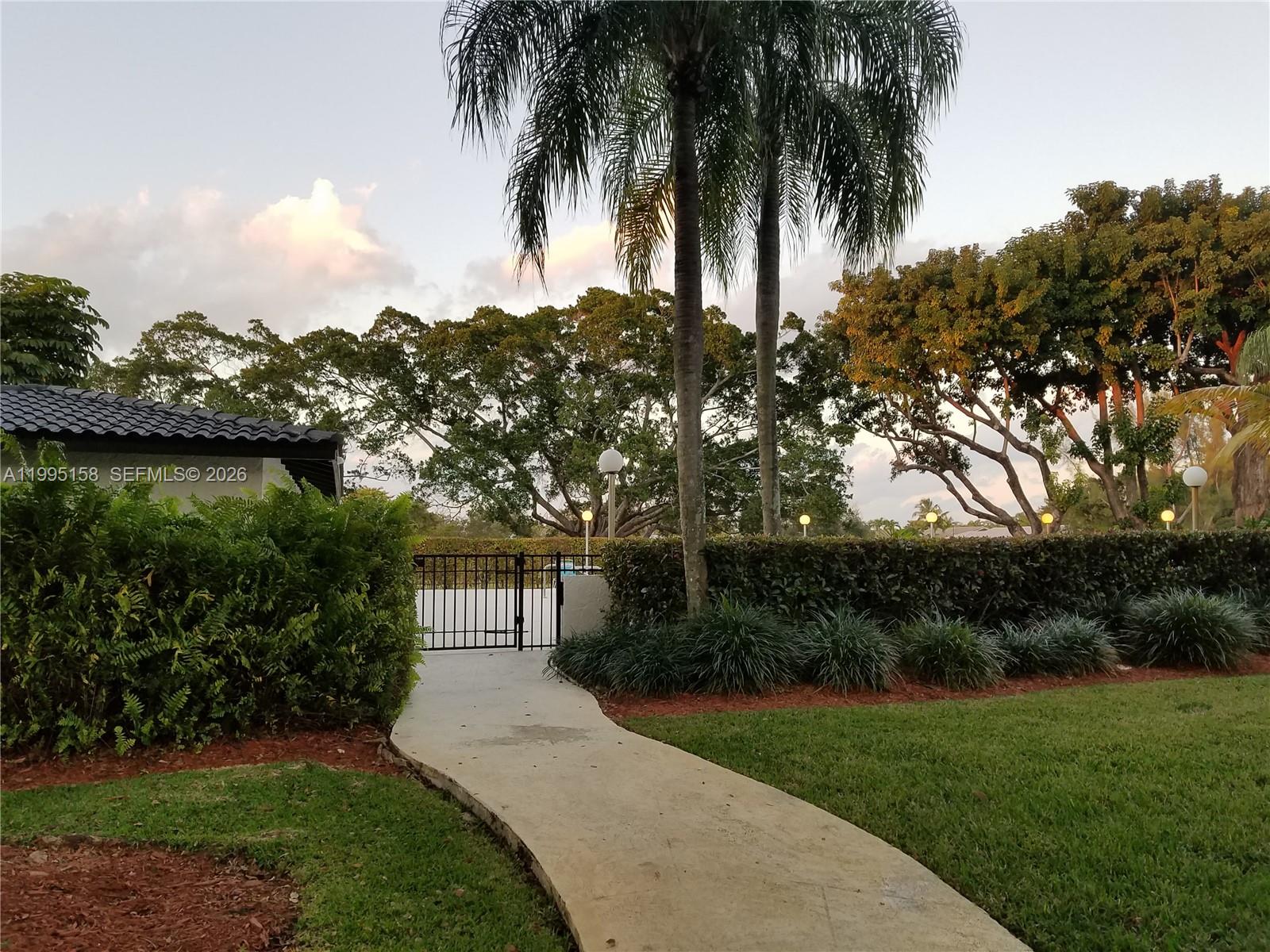 6161 Southwest 90th Court, Unit G2 Miami, FL 33173 - Photo 40 of 47 a view of a backyard