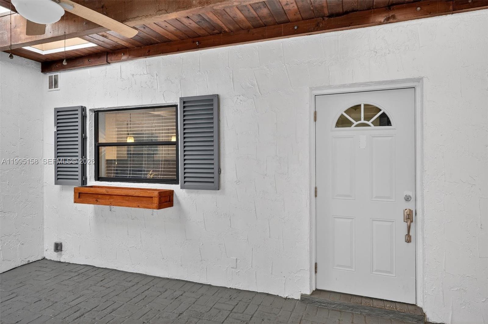 6161 Southwest 90th Court, Unit G2 Miami, FL 33173 - Photo 4 of 47 a view of an entryway door