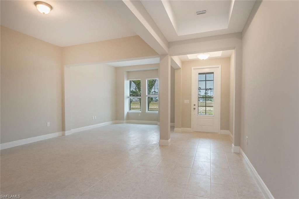3509 Pilot Circle Naples, FL 34120 - Photo 3 of 32 an empty room with windows
