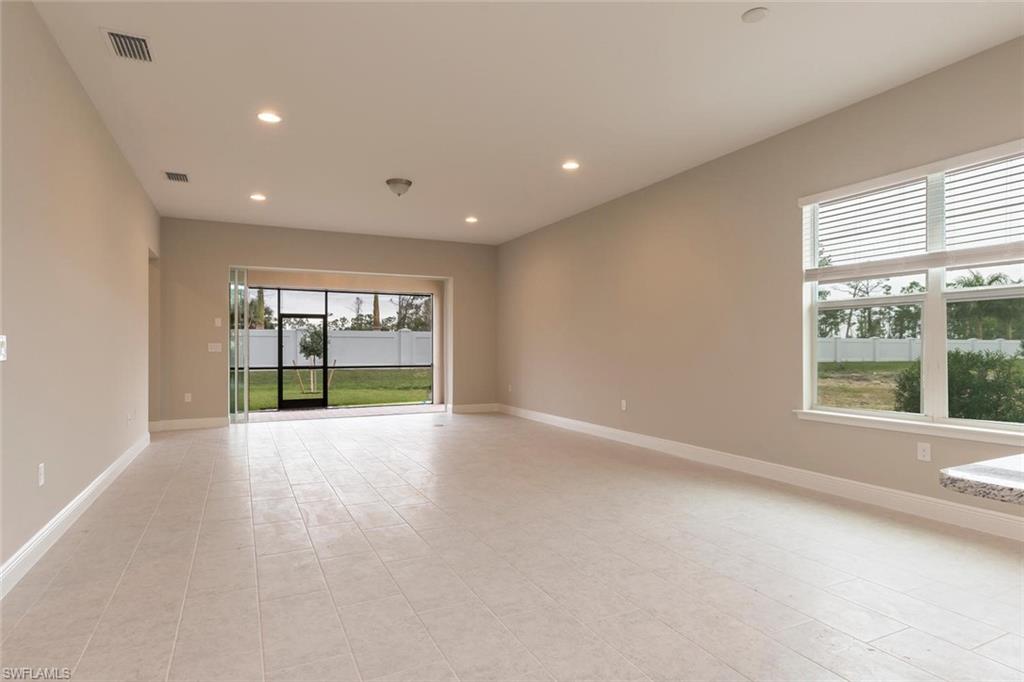 3509 Pilot Circle Naples, FL 34120 - Photo 6 of 32 a view of an empty room with a window