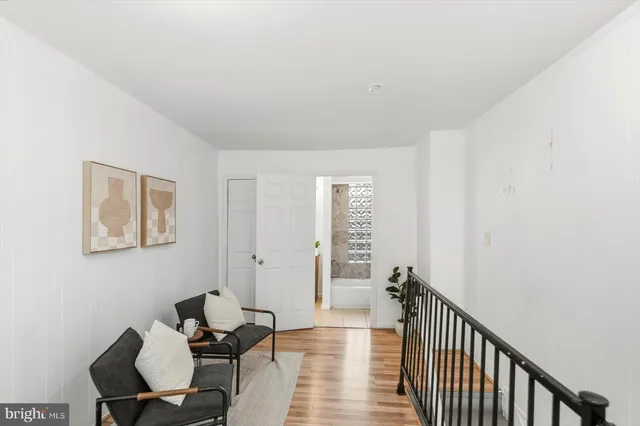 a view of a room with furniture window and wooden floor