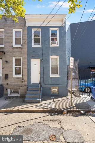 a front view of a building with street view