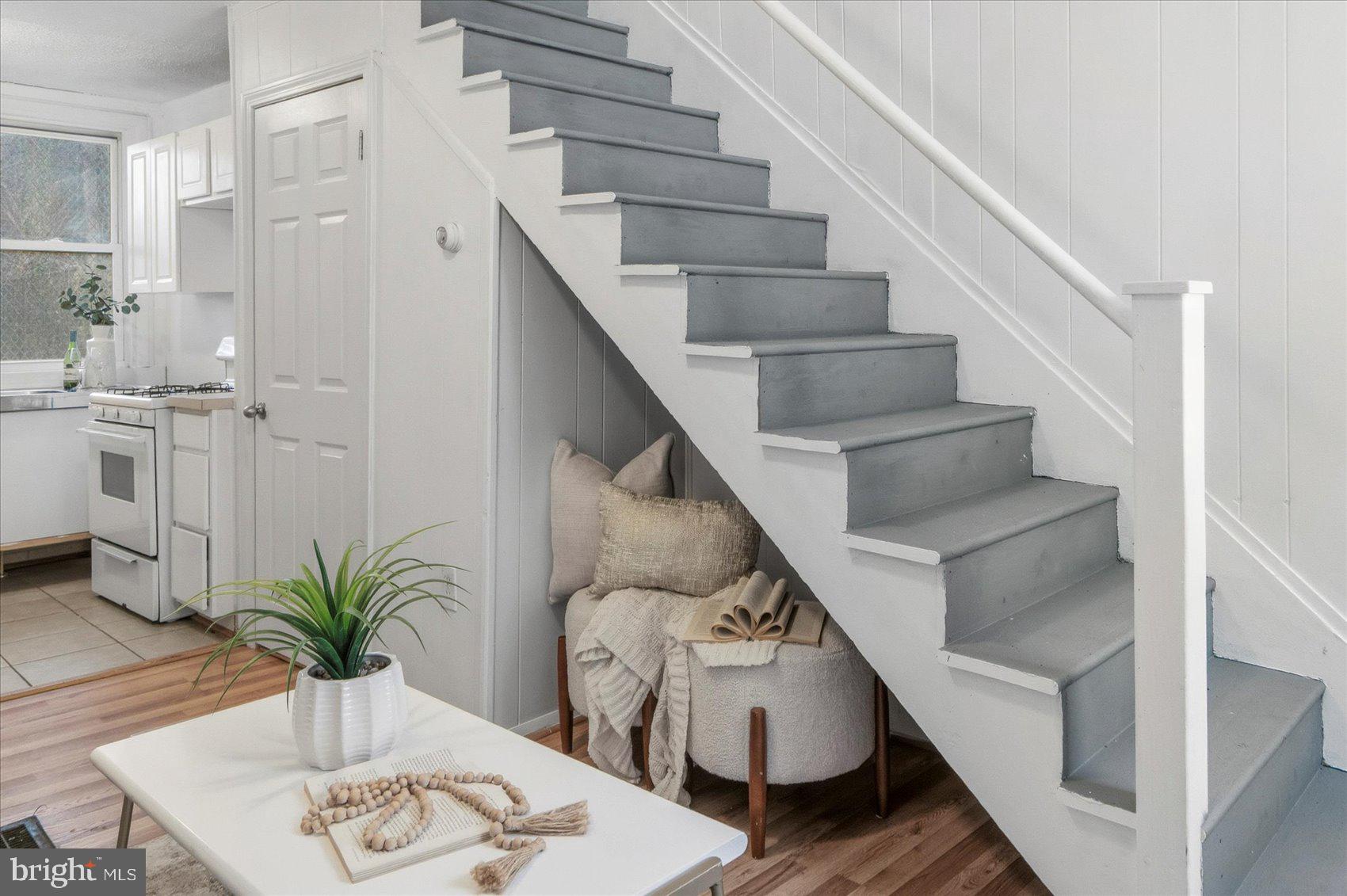 1017 Sterrett Street Baltimore, MD 21230 - Photo 7 of 29 a view of entryway and hall with wooden floor