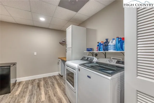 a utility room with washer and dryer