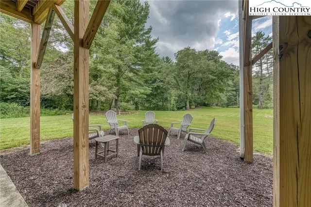 a view of a patio with a backyard