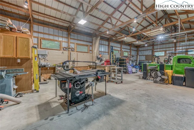 a view of a tables and chairs in a room