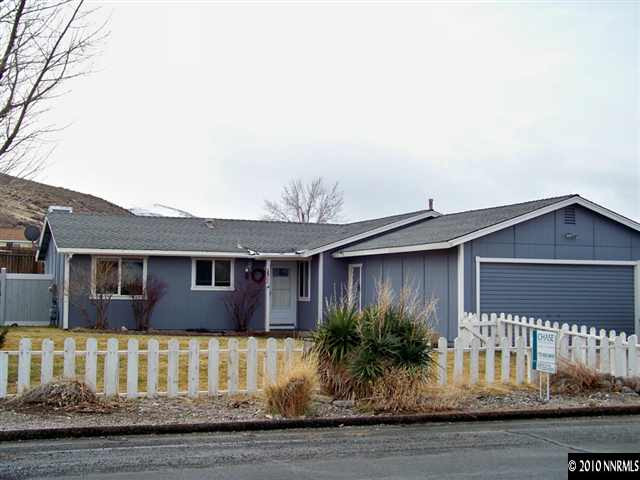 14035 Perlite Drive Reno, NV 89521 - Photo 1 of 5 a front view of a house with garden