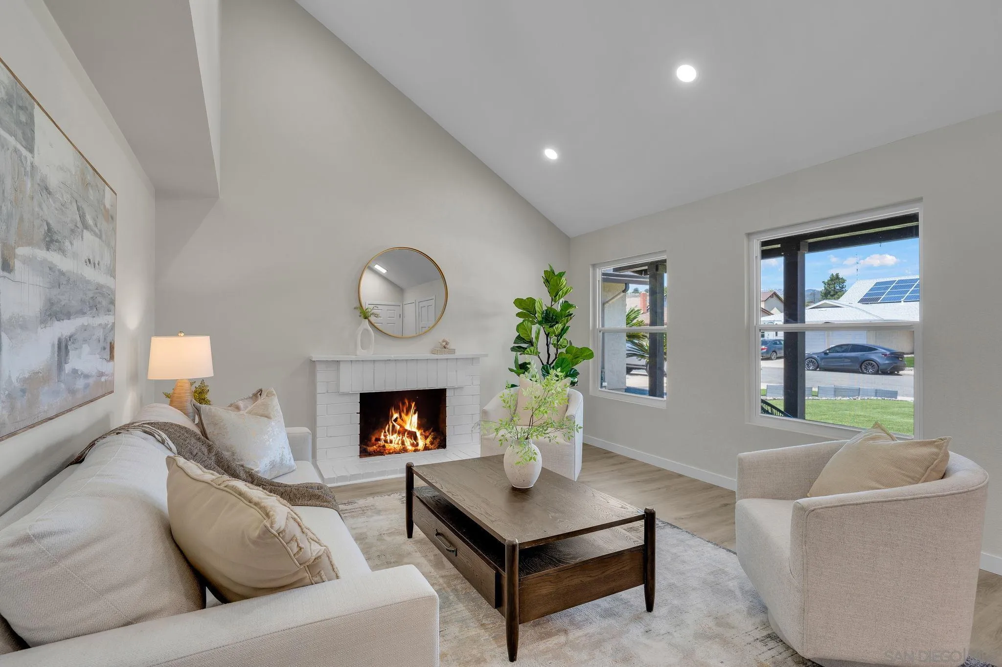 13322 Via Mark Poway, CA 92064 - Photo 3 of 25 a living room with furniture and a fireplace