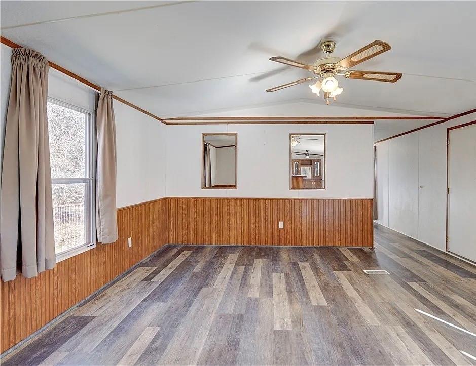 3697 Fm 2808 Road Kempner, TX 76539 - Photo 4 of 18 a view of wooden floor and windows in a room