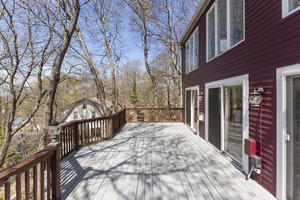 43 Farina Road Hull, MA 02045 - Photo 15 of 39 a view of a house with a small yard next to a house