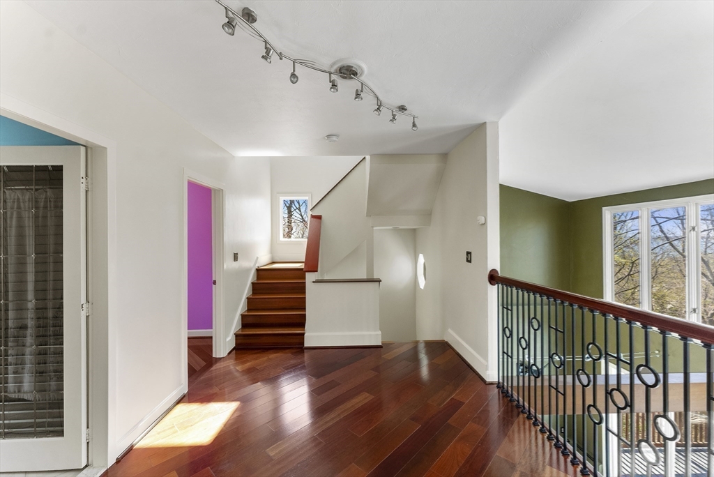 43 Farina Road Hull, MA 02045 - Photo 20 of 39 a view of entryway with wooden floor and stairs