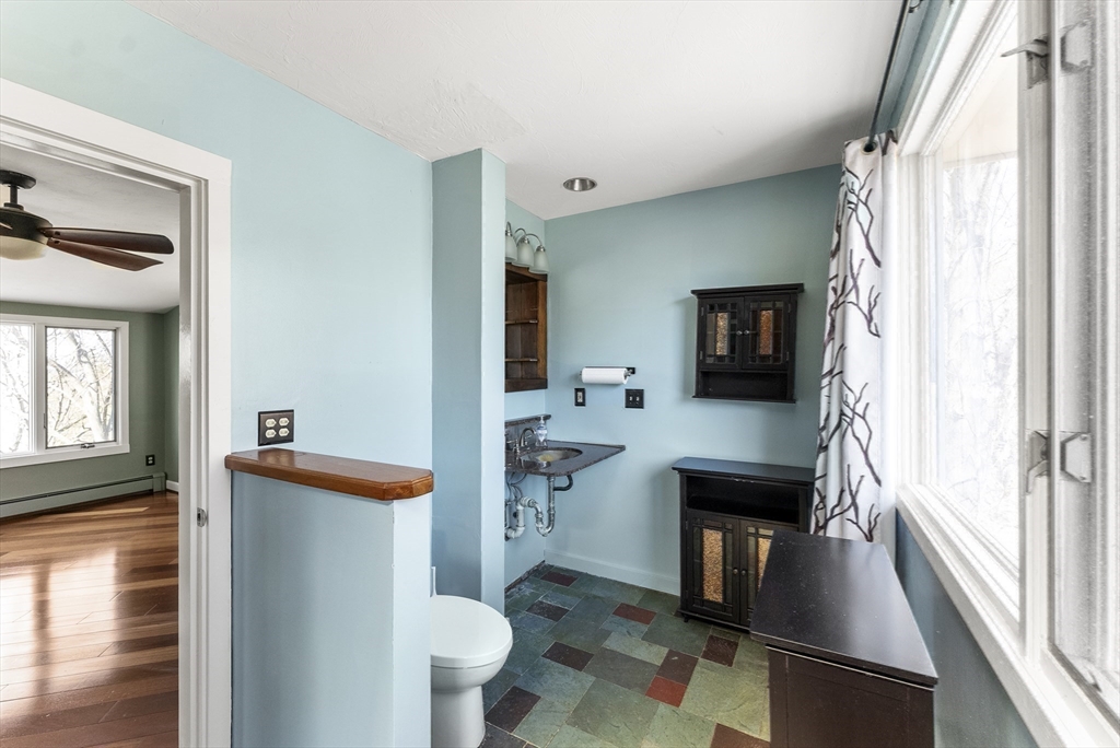 43 Farina Road Hull, MA 02045 - Photo 29 of 39 a living room with furniture a rug and a window