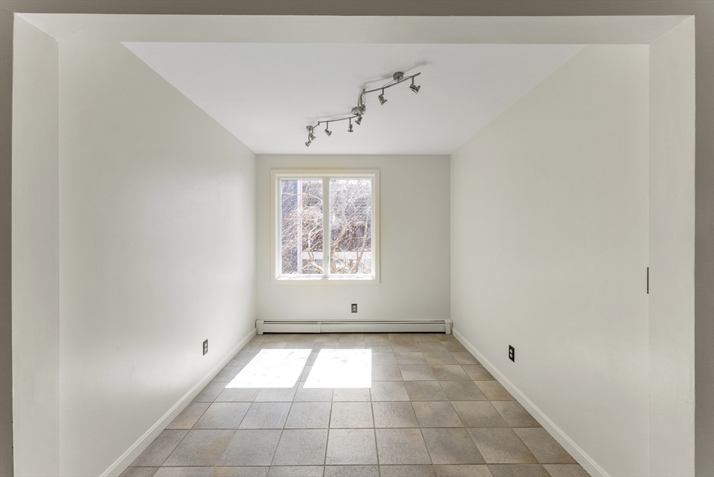 43 Farina Road Hull, MA 02045 - Photo 7 of 39 a view of an empty room with a window