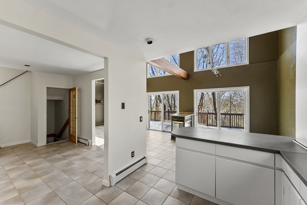 43 Farina Road Hull, MA 02045 - Photo 9 of 39 a kitchen with stainless steel appliances granite countertop a refrigerator and a sink