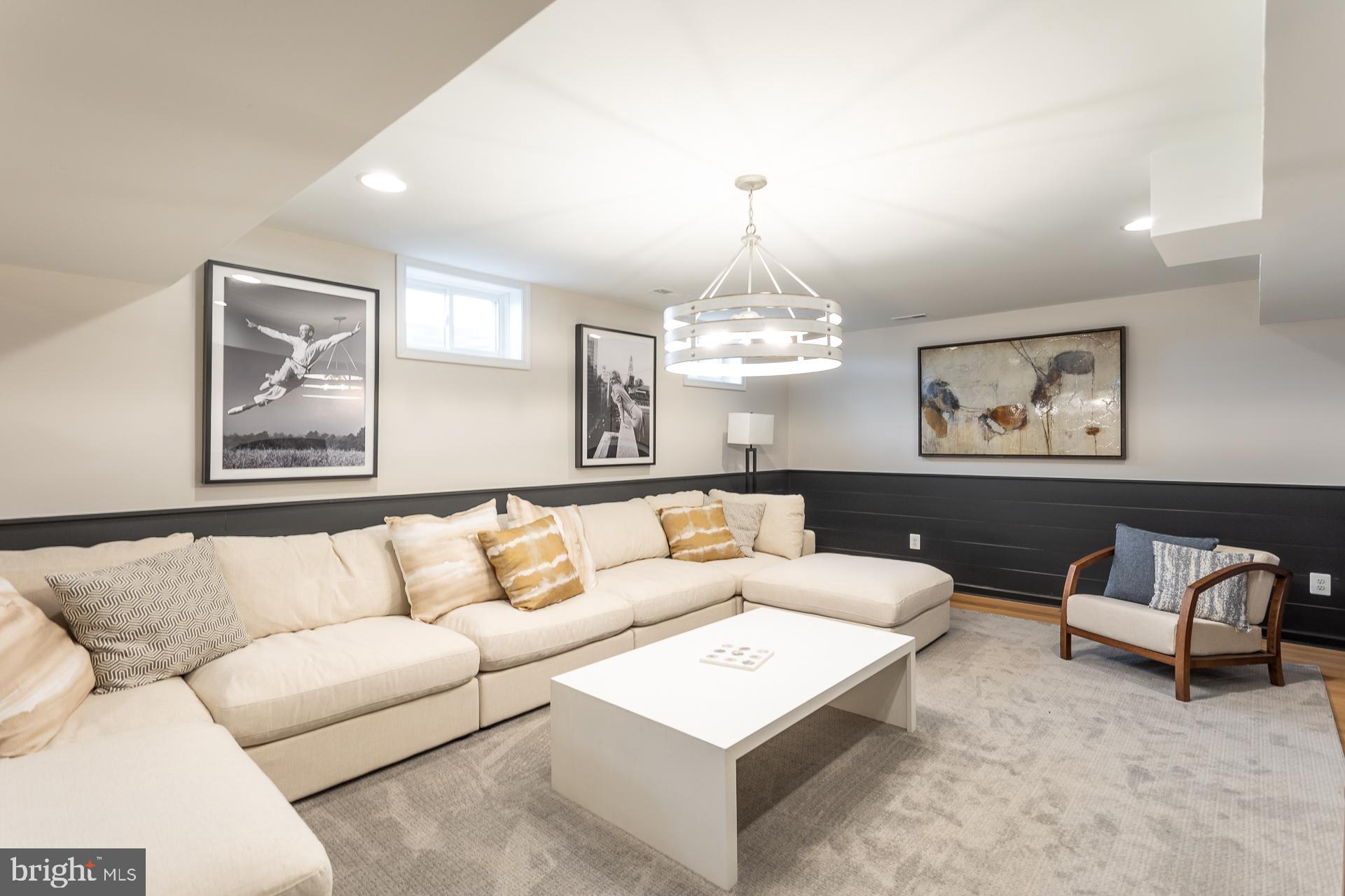 500 Benjamin Drive Hanover, PA 17331 - Photo 18 of 22 a living room with furniture a chandelier and a window