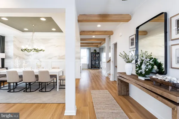 a view of a living room and dining room