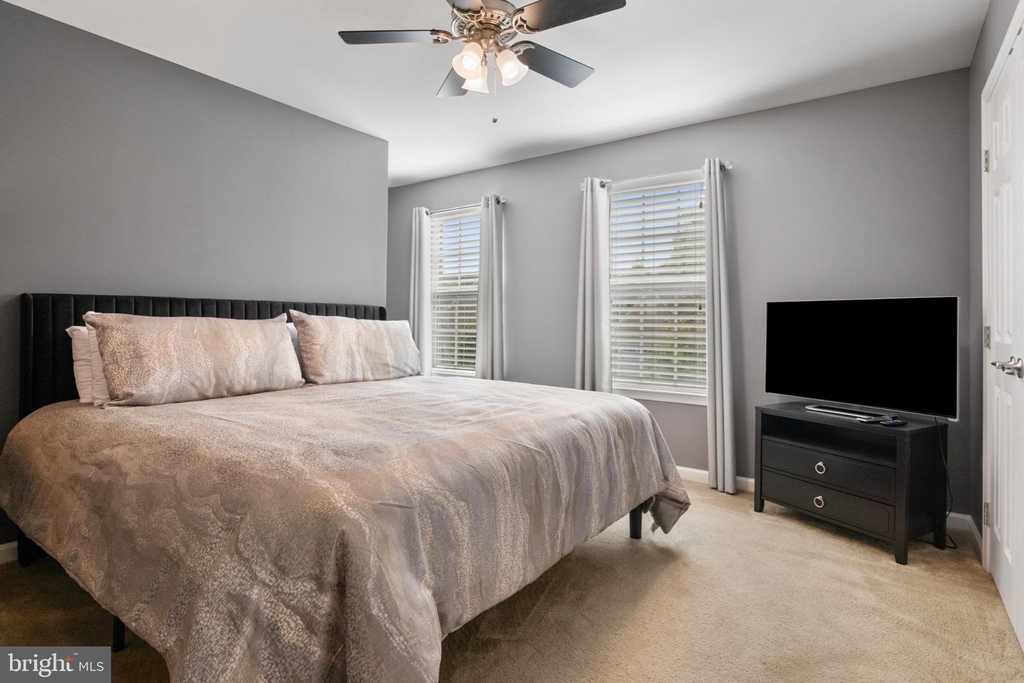 856 Countryside Road Seven Valleys, PA 17360 - Photo 17 of 47 a bedroom with a bed and a flat screen tv