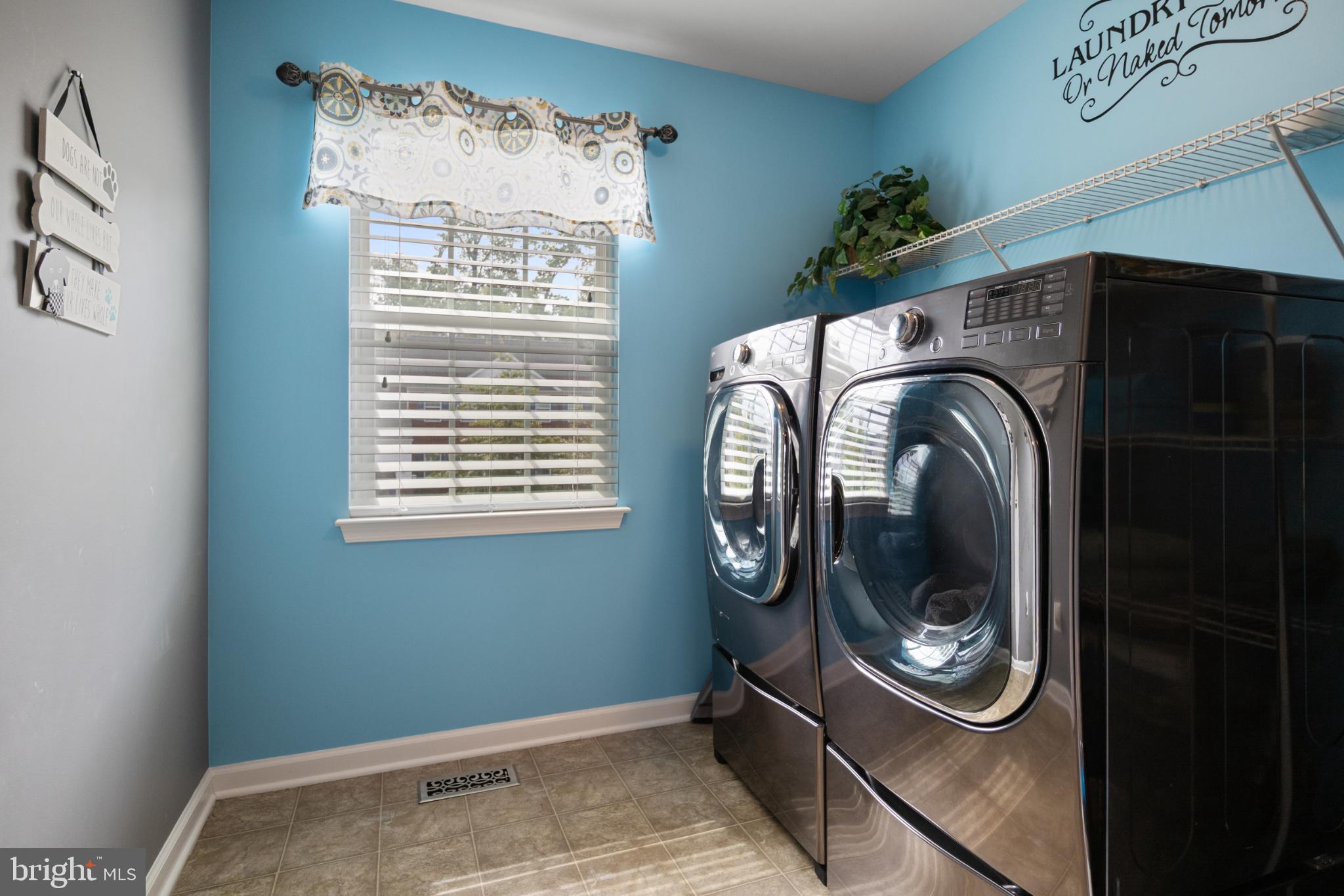 856 Countryside Road Seven Valleys, PA 17360 - Photo 19 of 47 a view of a hallway with washer and dryer