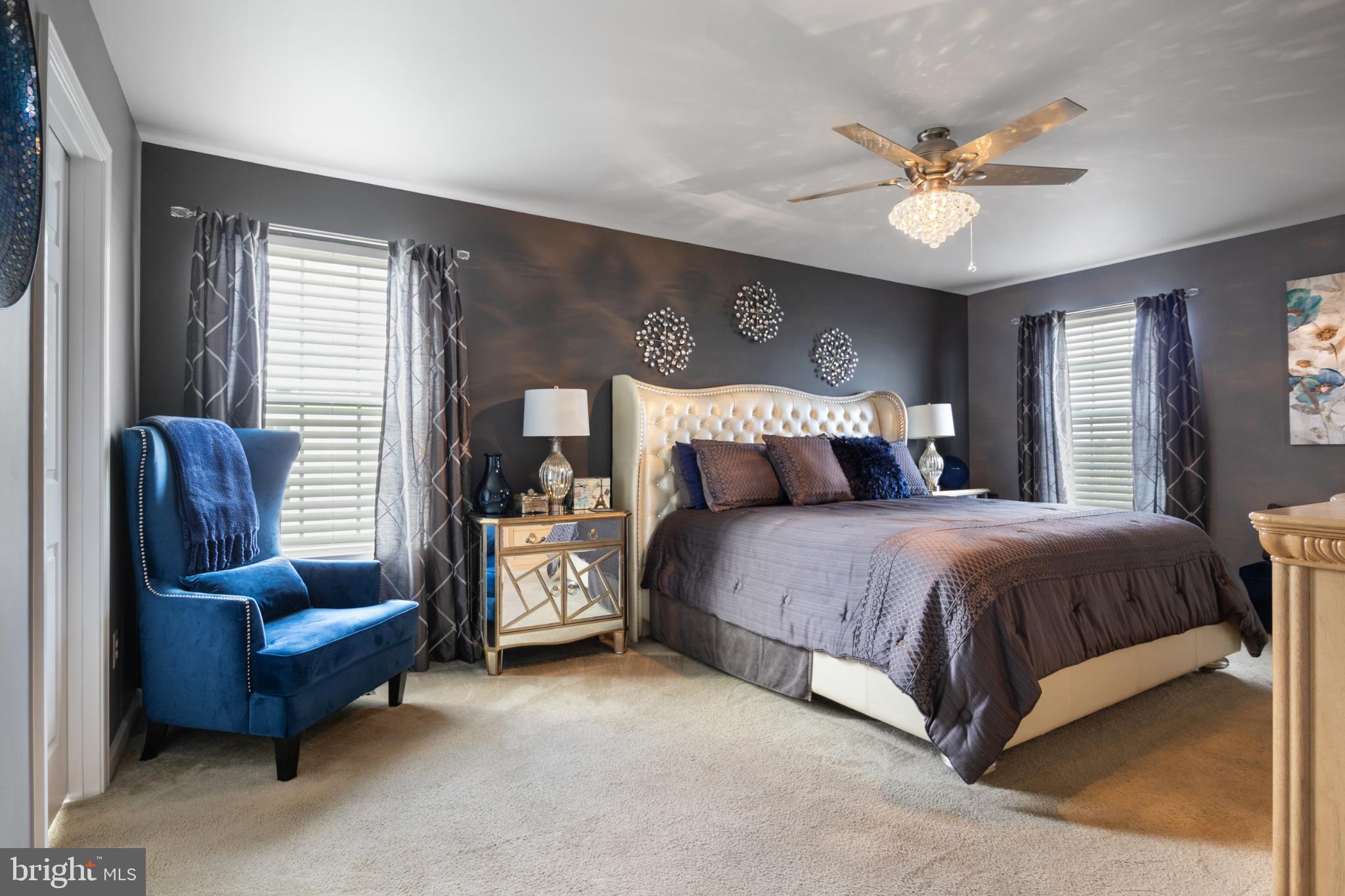 856 Countryside Road Seven Valleys, PA 17360 - Photo 21 of 47 a bedroom with bed couch and window