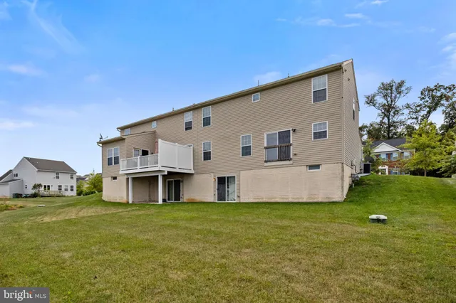 a view of a house with a big yard