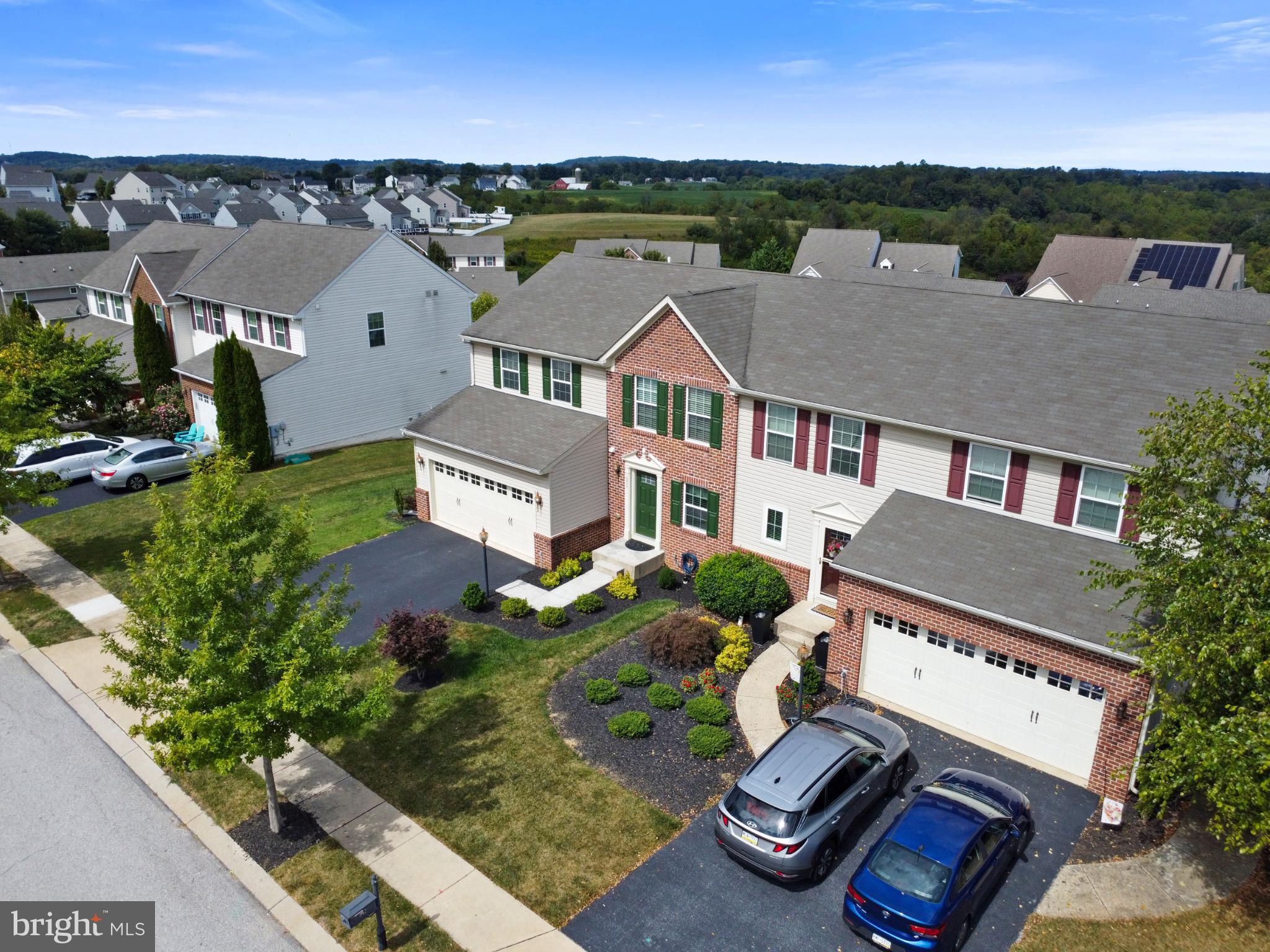 856 Countryside Road Seven Valleys, PA 17360 - Photo 35 of 47 an aerial view of multiple houses with a yard