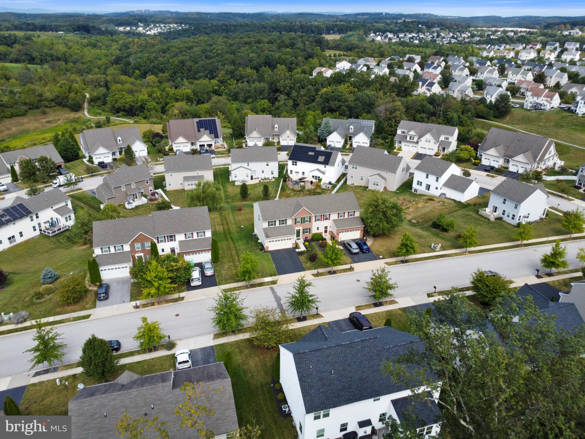856 Countryside Road Seven Valleys, PA 17360 - Photo 40 of 47 an aerial view of a houses with a terrace