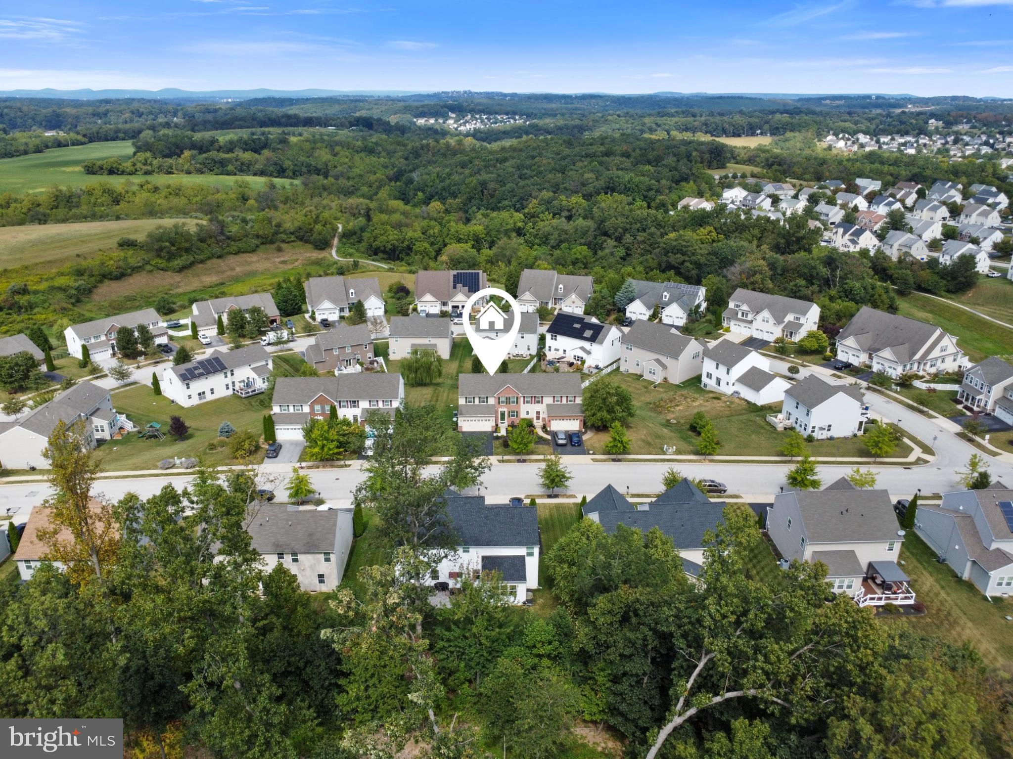 856 Countryside Road Seven Valleys, PA 17360 - Photo 42 of 47 a view of a city with mountains in the background