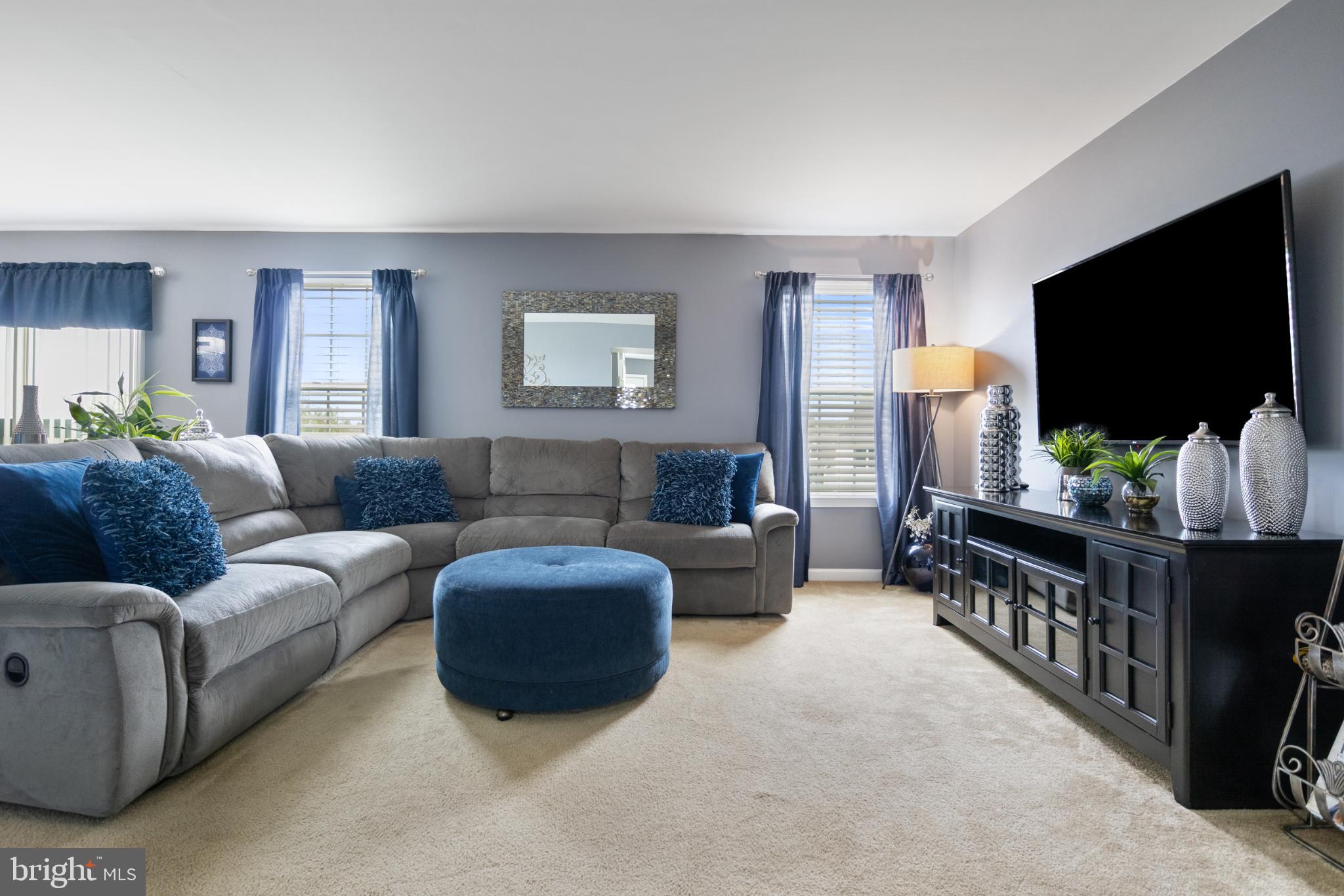 856 Countryside Road Seven Valleys, PA 17360 - Photo 6 of 47 a living room with furniture and a flat screen tv