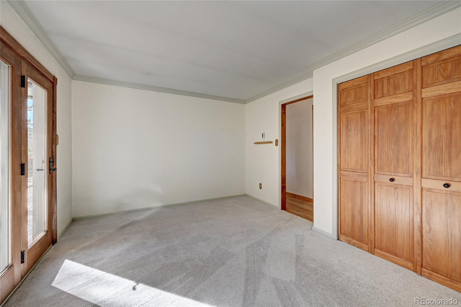 32856 Timber Ridge Road Evergreen, CO 80439 - Photo 14 of 41 an empty room with closet