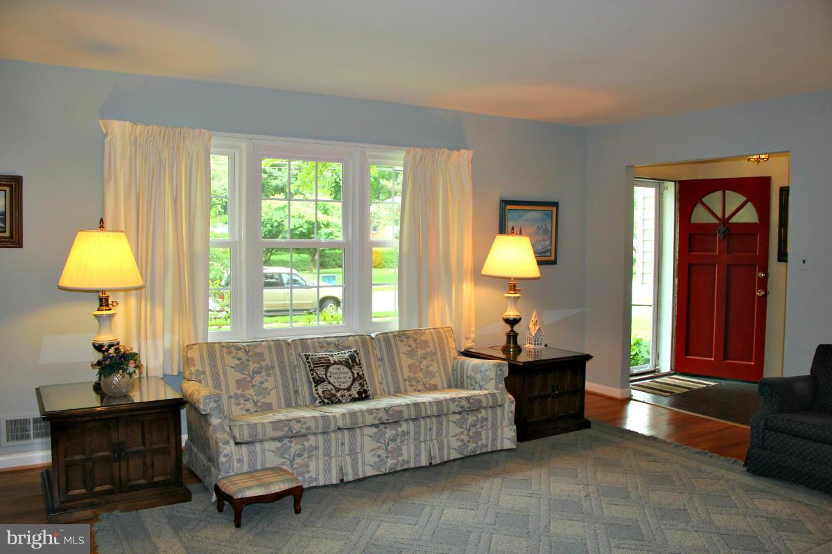 1931 Foxhall Road McLean, VA 22101 - Photo 4 of 21 a living room with furniture and a window