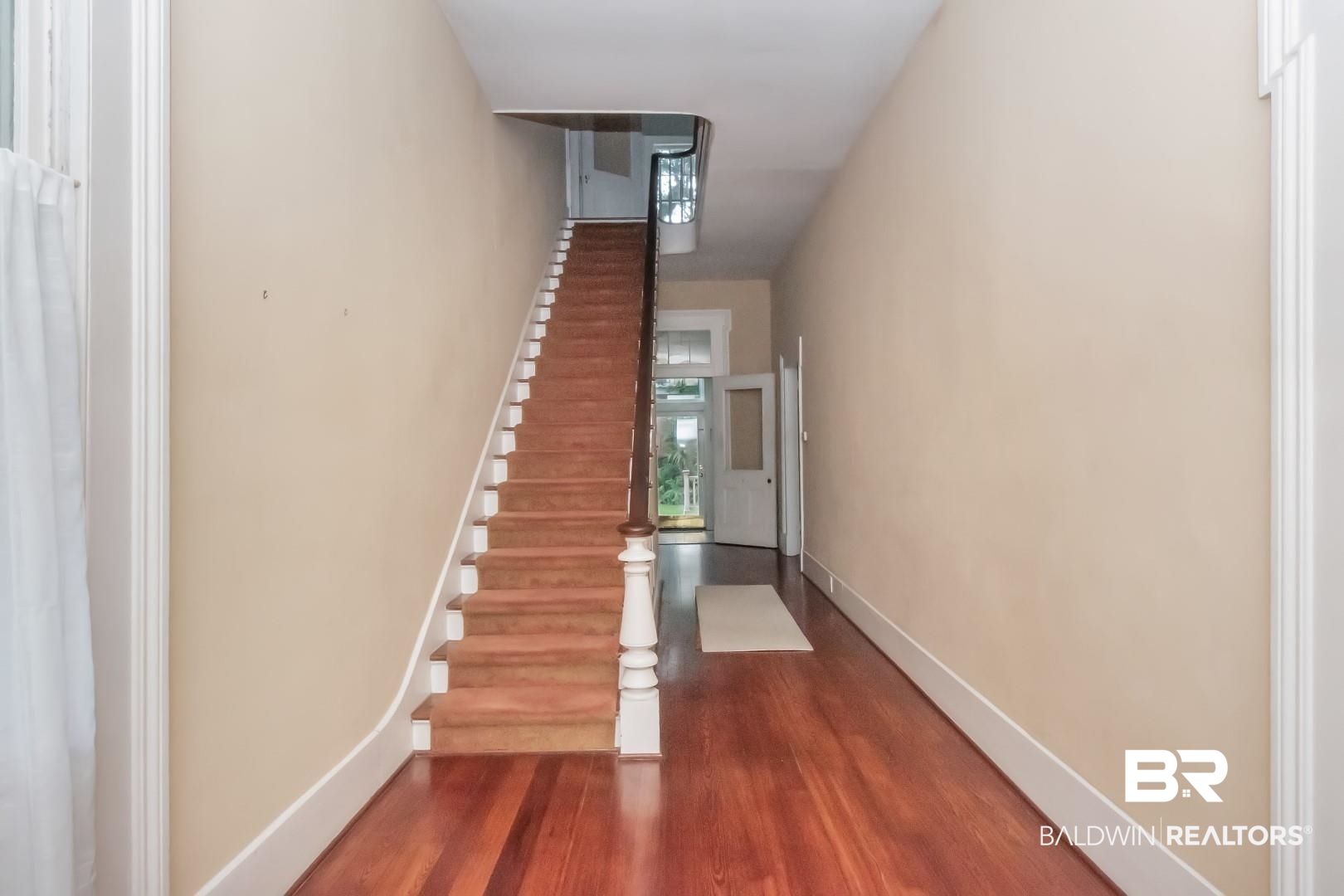 959 Dauphin Street Mobile, AL 36604 - Photo 2 of 43 Staircase featuring hardwood / wood-style flooring