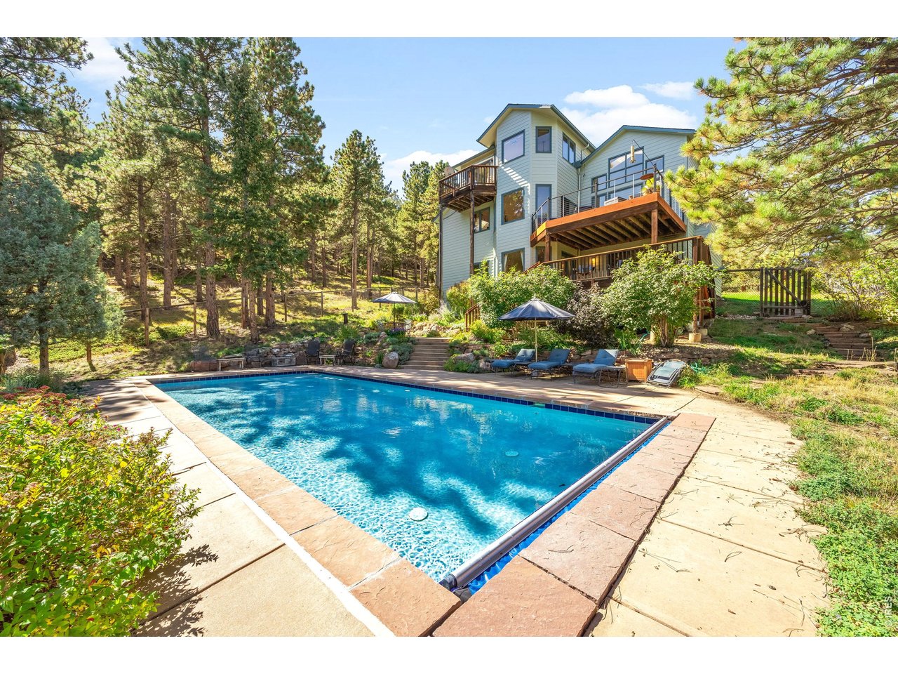 191 Alaska Road Boulder, CO 80302 - Photo 36 of 41 pool and rear home exterior