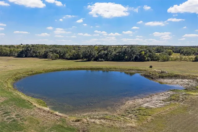 a view of a city with an ocean