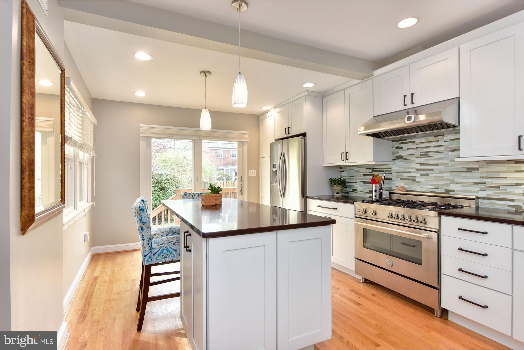 4504 Chesapeake Street Northwest Washington, DC 20016 - Photo 5 of 21 Kitchen with Breakfast Bar- seating for 3