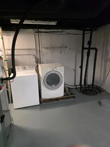 a utility room with a washer and dryer
