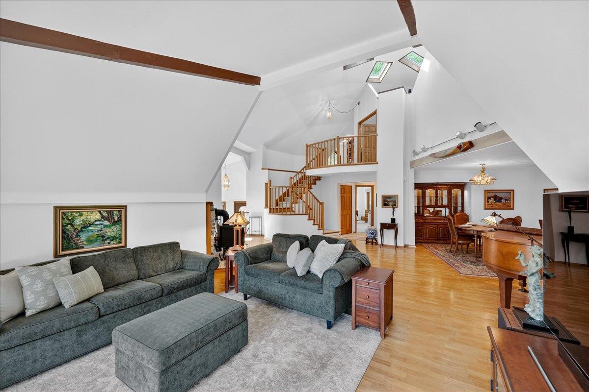 5224 Twin Falls Road Morgan Hill, CA 95037 - Photo 18 of 111 a living room with furniture and a dining table