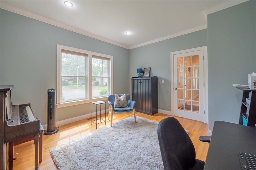 15 Hickory Street Lexington, MA 02421 - Photo 23 of 42 a living room with furniture and a window