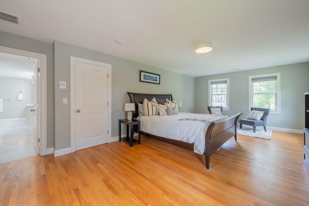 15 Hickory Street Lexington, MA 02421 - Photo 25 of 42 a bedroom with a bed and window