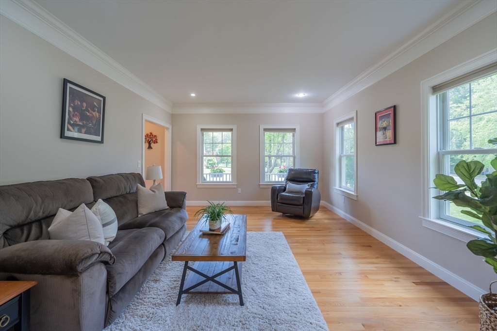 15 Hickory Street Lexington, MA 02421 - Photo 3 of 42 a living room with furniture and a wooden floor