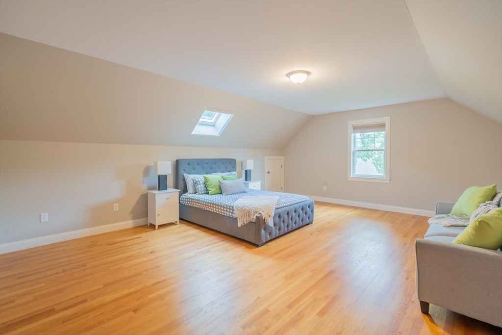 15 Hickory Street Lexington, MA 02421 - Photo 37 of 42 a spacious bedroom with a bed and window