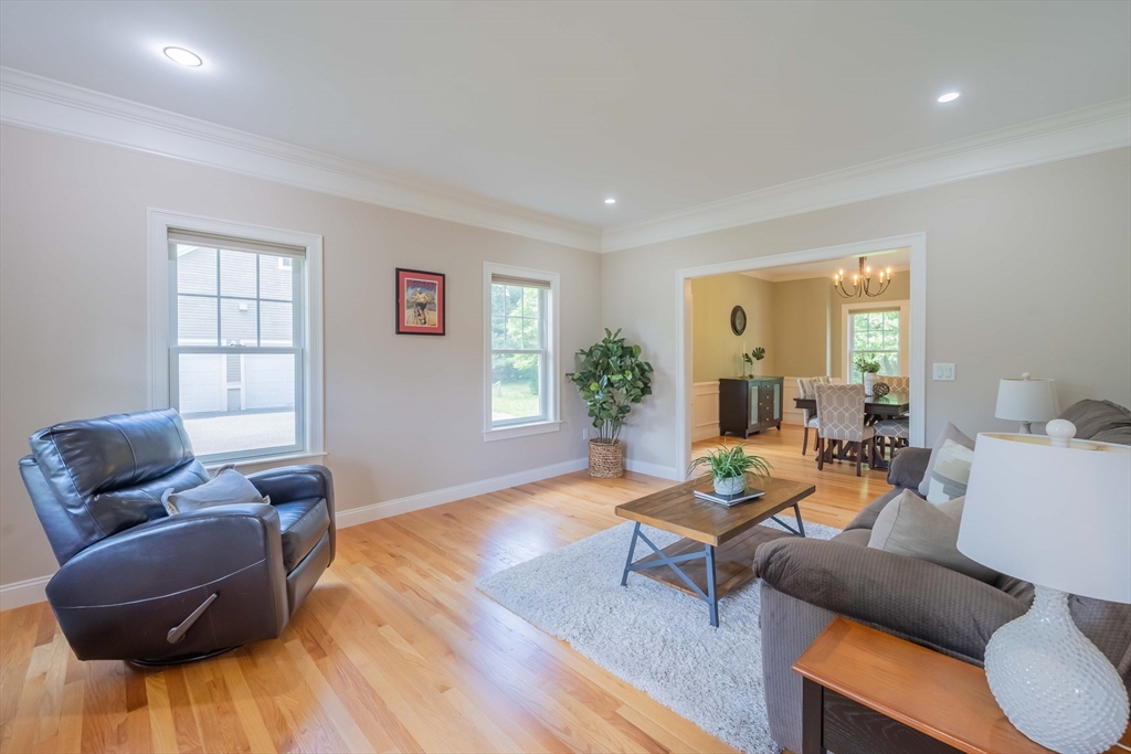 15 Hickory Street Lexington, MA 02421 - Photo 6 of 42 a living room with furniture and wooden floor