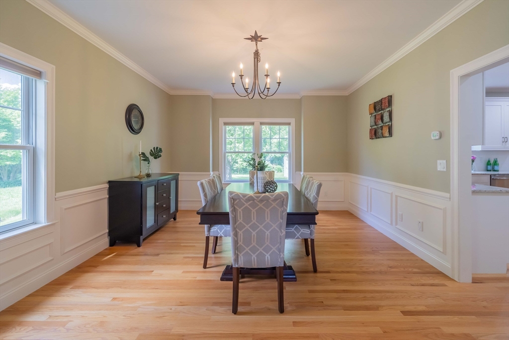 15 Hickory Street Lexington, MA 02421 - Photo 7 of 42 a view of a dining room with furniture window and wooden floor