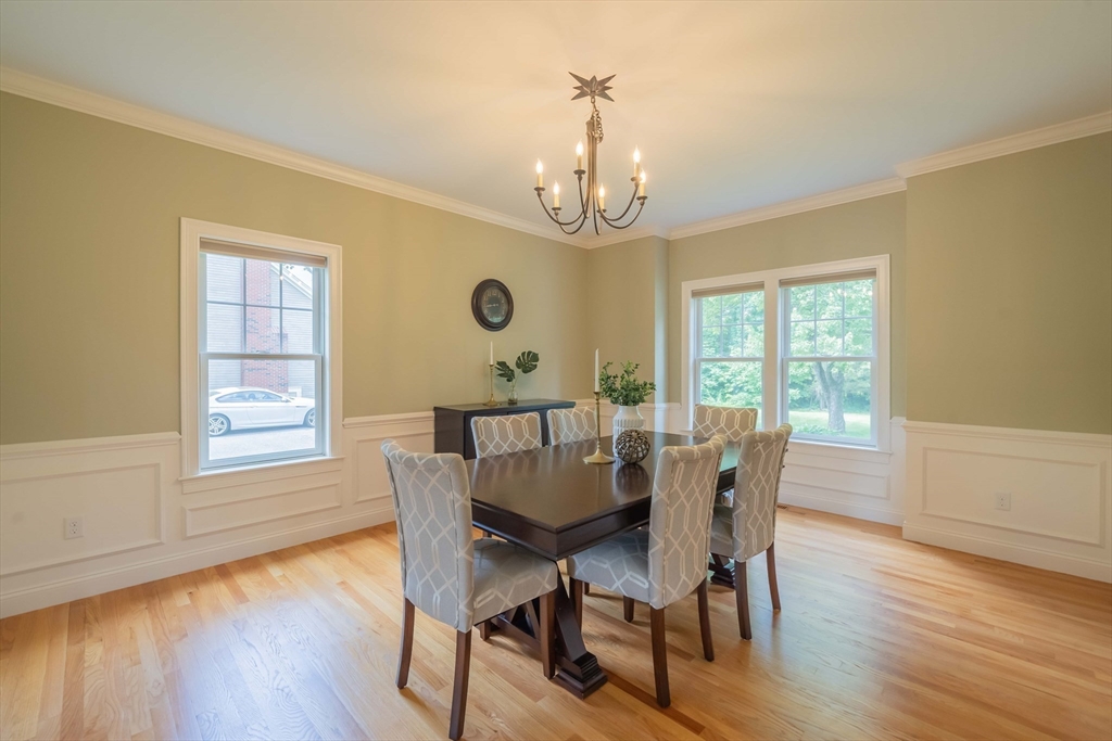 15 Hickory Street Lexington, MA 02421 - Photo 8 of 42 a view of a dining room with furniture window and wooden floor