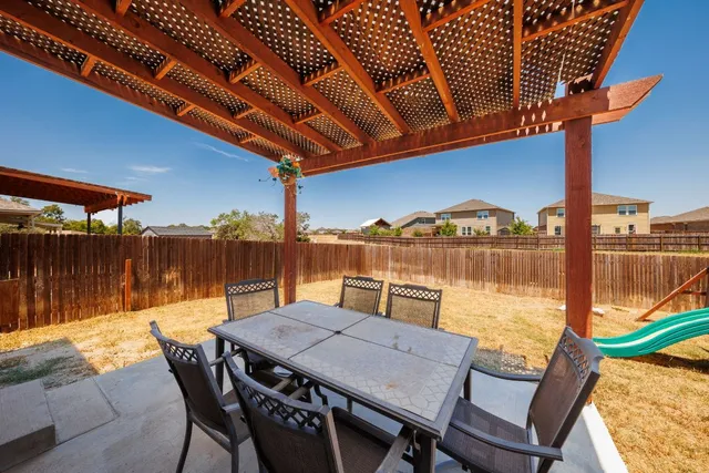 a view of a outdoor sitting area with furniture