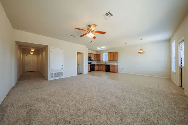 a view of a livingroom with a ceiling fan