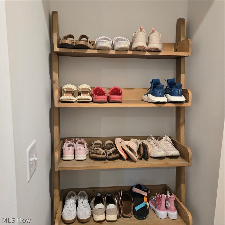 15229 Timber Ridge Drive Middlefield, OH 44062 - Photo 23 of 30 CUSTOM SHOE RACK NEAR GARAGE ENTRY