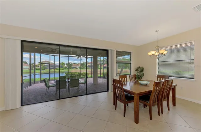 a bedroom with a bed and a television
