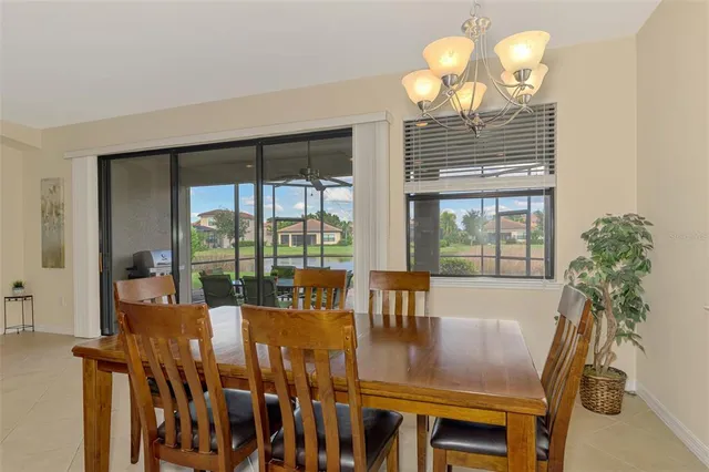 a bathroom with a granite countertop double vanity sink mirror and shower