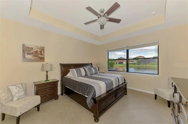 a white bath tub sitting next to a shower