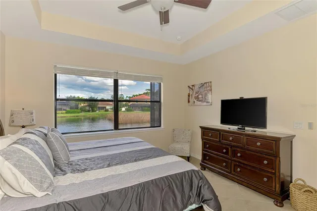 a bathroom with a granite countertop sink a shower and mirror